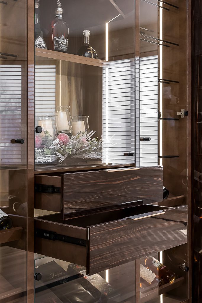 Detail of built in drawers in wine cellar