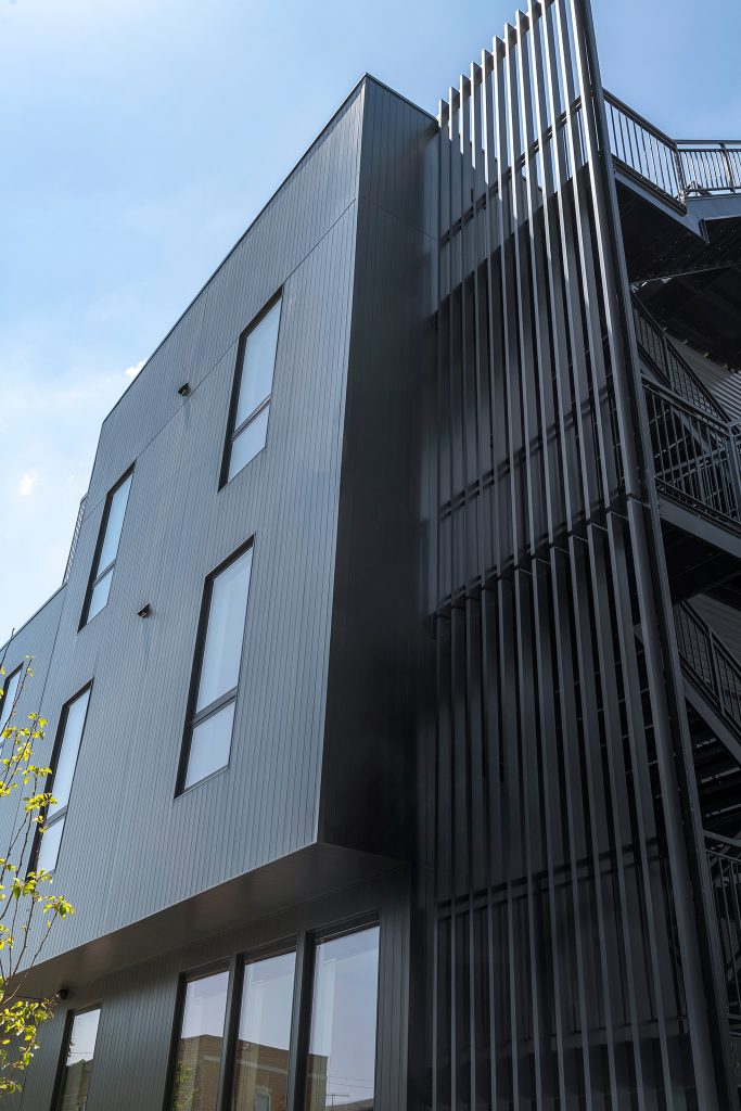 Modern Black Building Exterior by Avenue Builders, Architectural Photography in Chicago