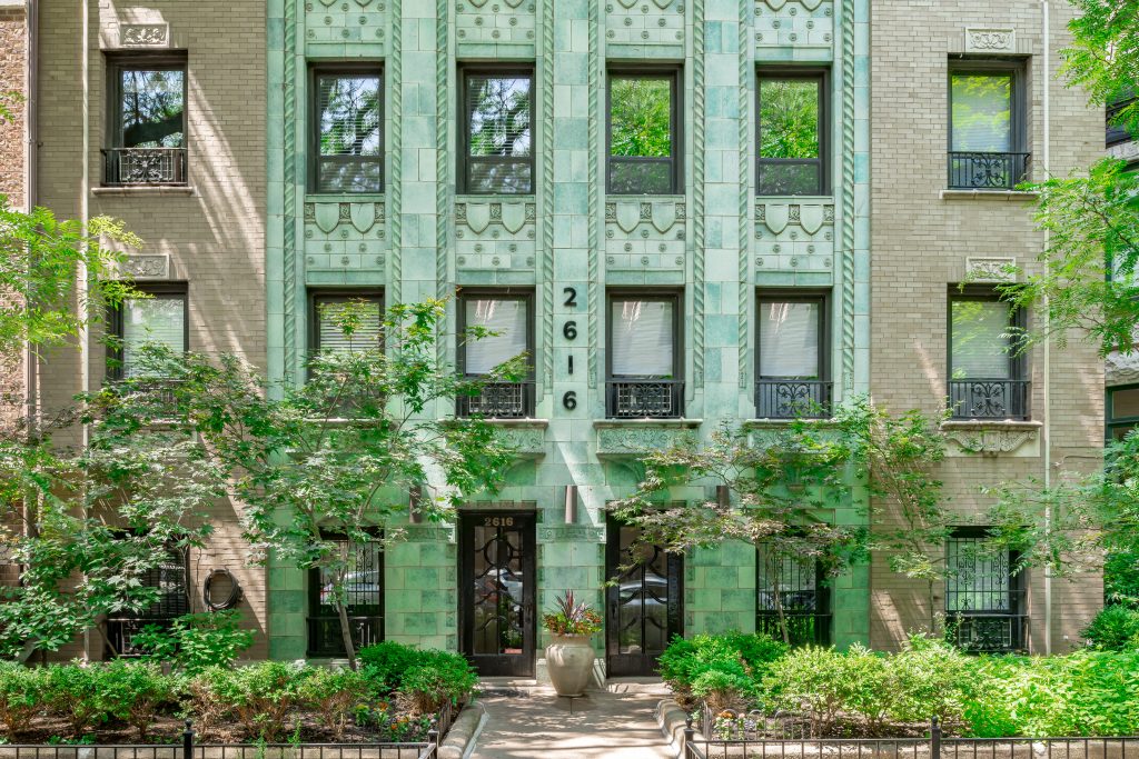Exterior image of a vintage entrance to classic Chicago apartment building