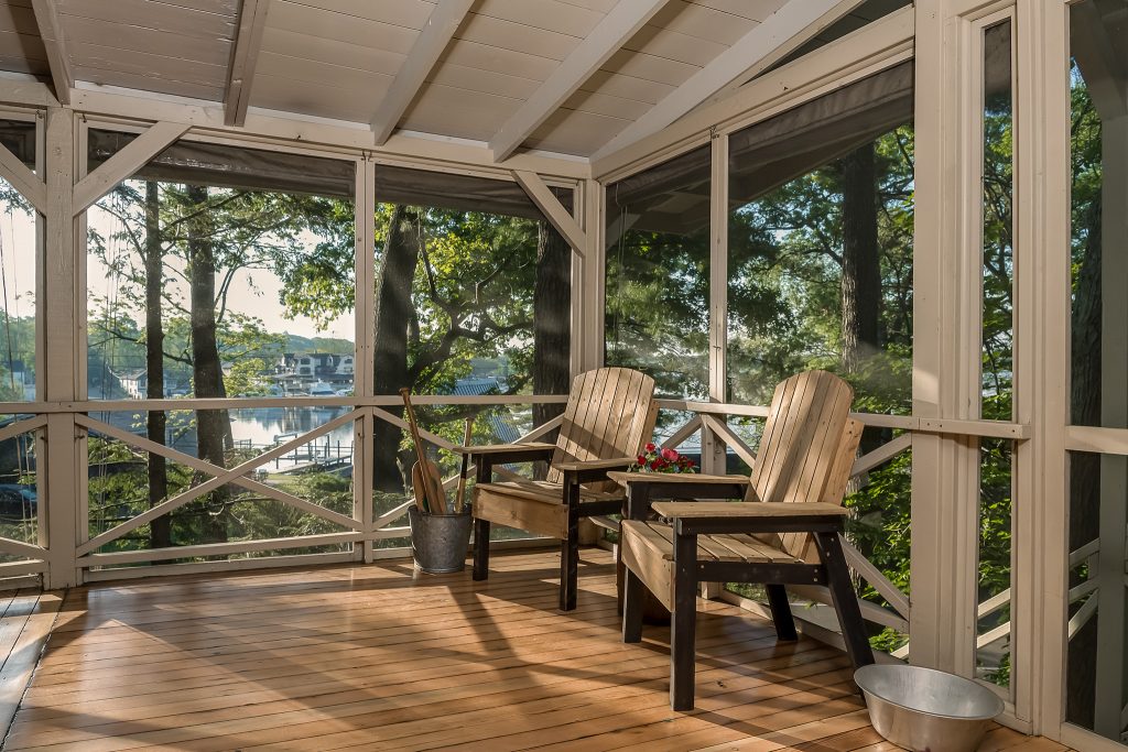 Finished seasonal porch in short term vacation rental for Lakeshore Lodge, Architectural Photography in Chicago