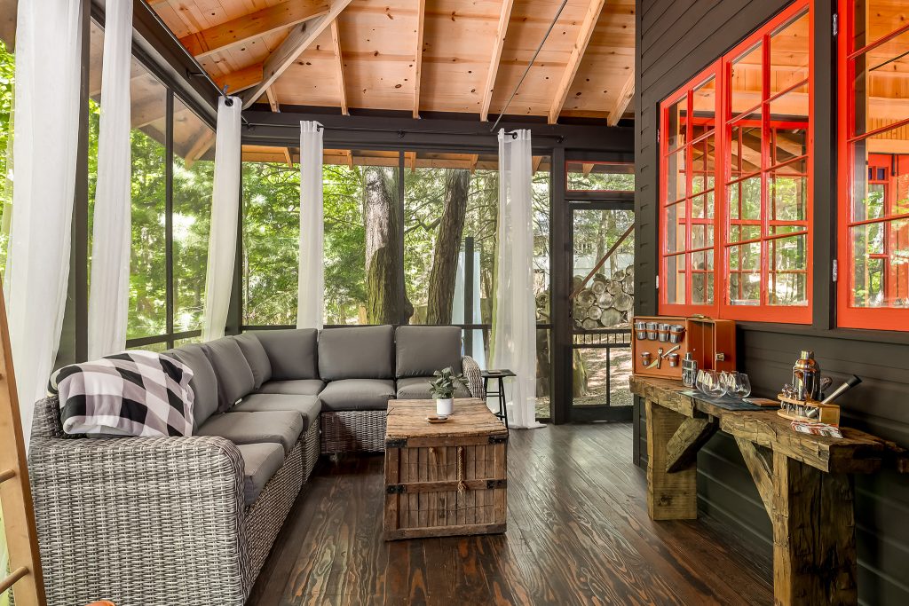 Finished seasonal porch in short term vacation rental for Lakeshore Lodge, Architectural Photography in Chicago