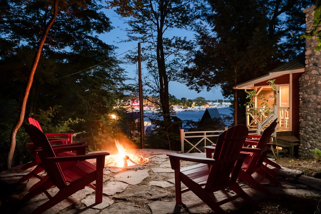 Twilight photo of outdoor fire pit at short term vacation rental for Lakeshore Lodge, Architectural Photography in Chicago