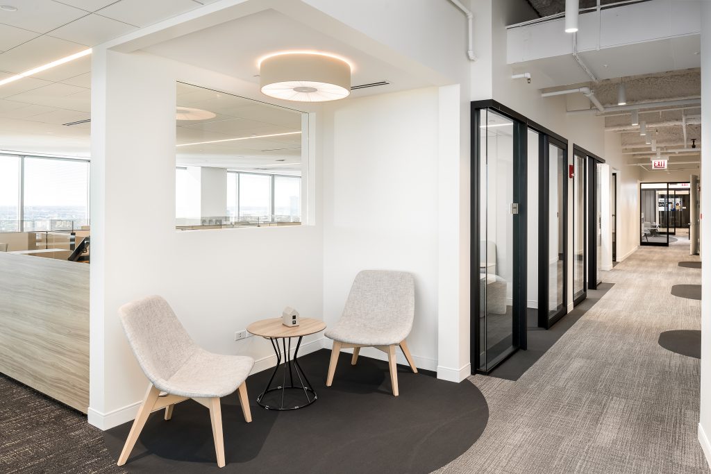 Interior Office Hallway with Client Seating, Baird & Warner Schaumburg, Design by CVG Architects, Construction by Bear Construction, Office Furniture by Henricksen