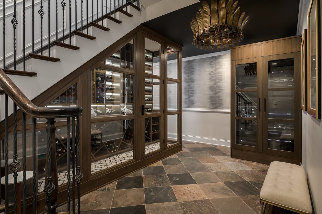Modern Custom Wine Cellar in Finished Basement Under Stairs