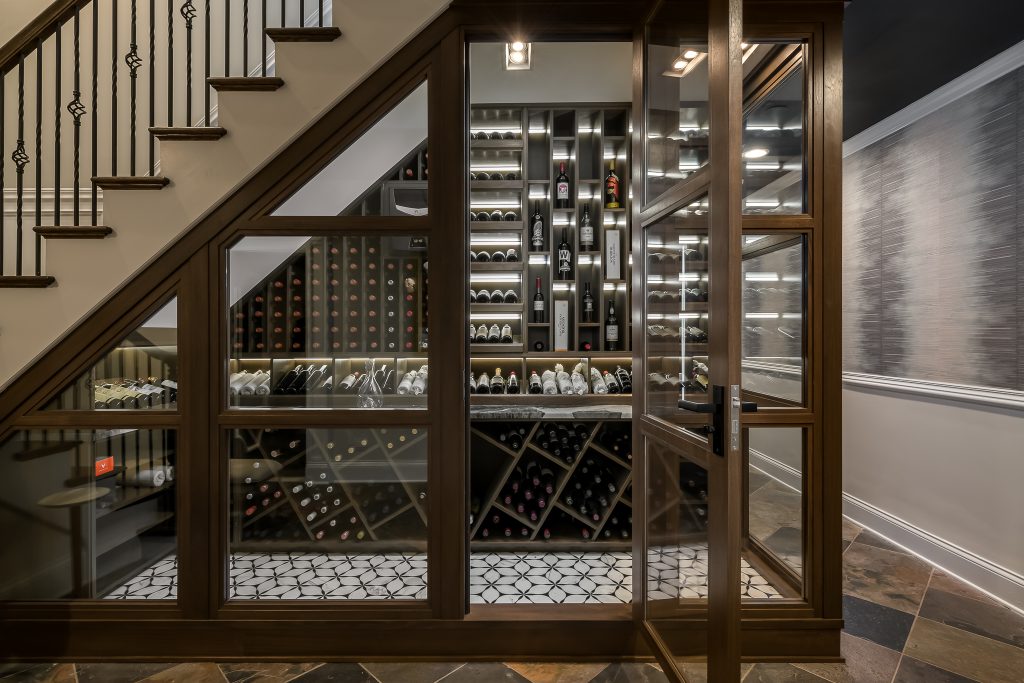 Modern Custom Wine Cellar in Finished Basement Under Stairs