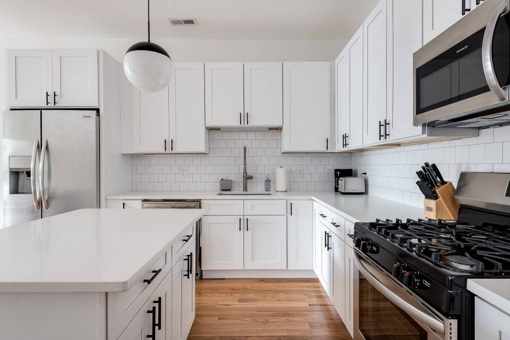 Modern White Kitchen with Basic Amenities