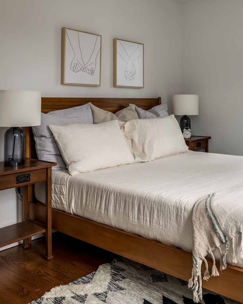 Detail of Cozy Bedding in White Minimalist Bedroom