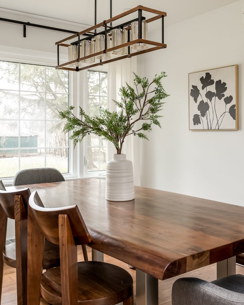 Detail of Dining room centerpiece with Mid Century Modern Light Fixture