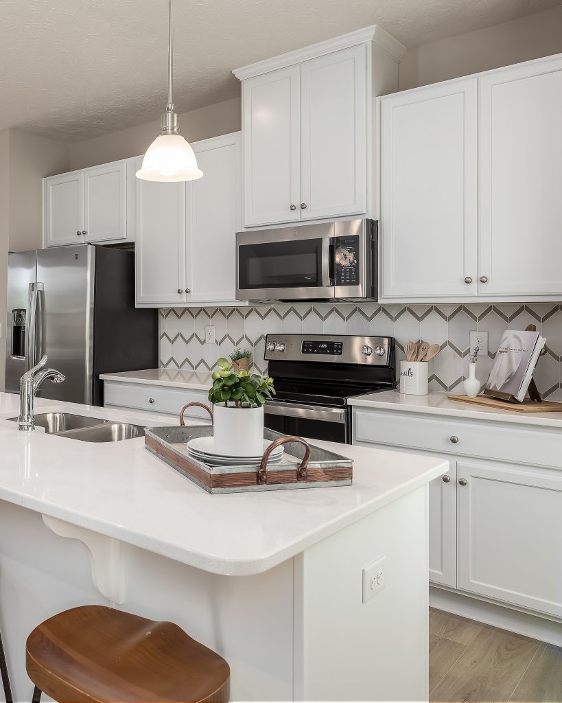 All white modern kitchen in Ryan Homes model home