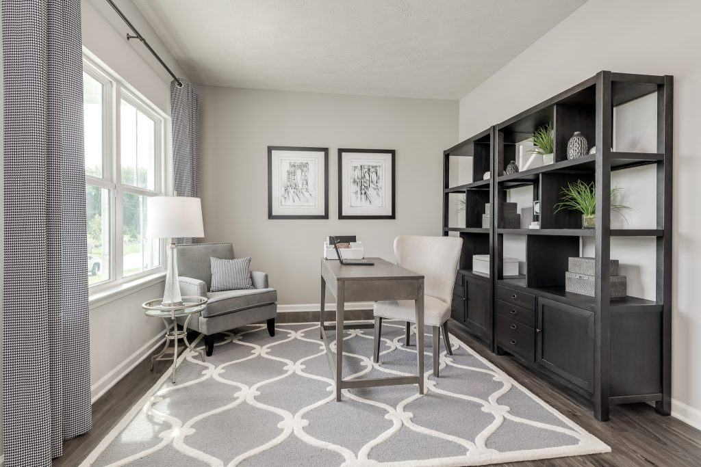 Staged home office with neutral home decor.