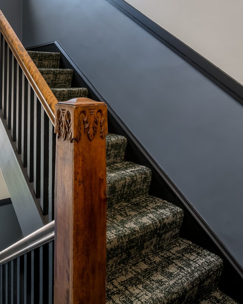 Detail of hand carved wooden banister