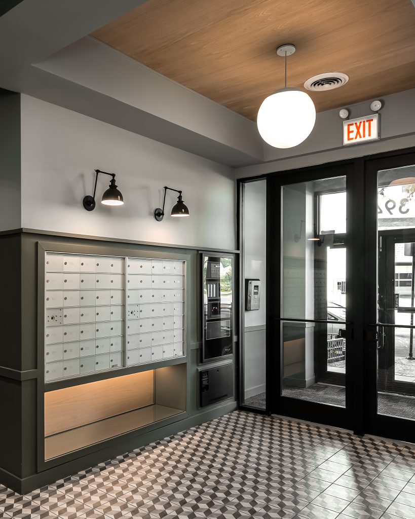 Dark and Moody Mailroom in Renovated Chicago Apartment Building