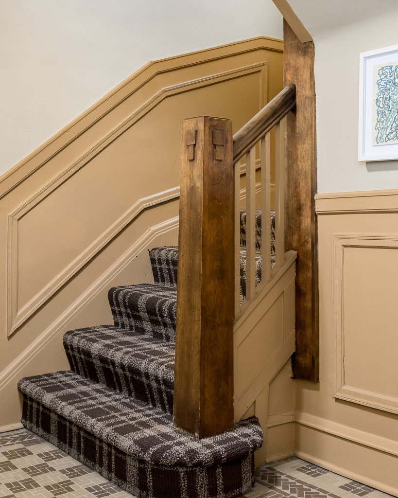 Vintage staircase banister detail in apartment building