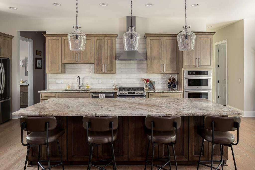 Custom kitchen with wood tones and traditional details