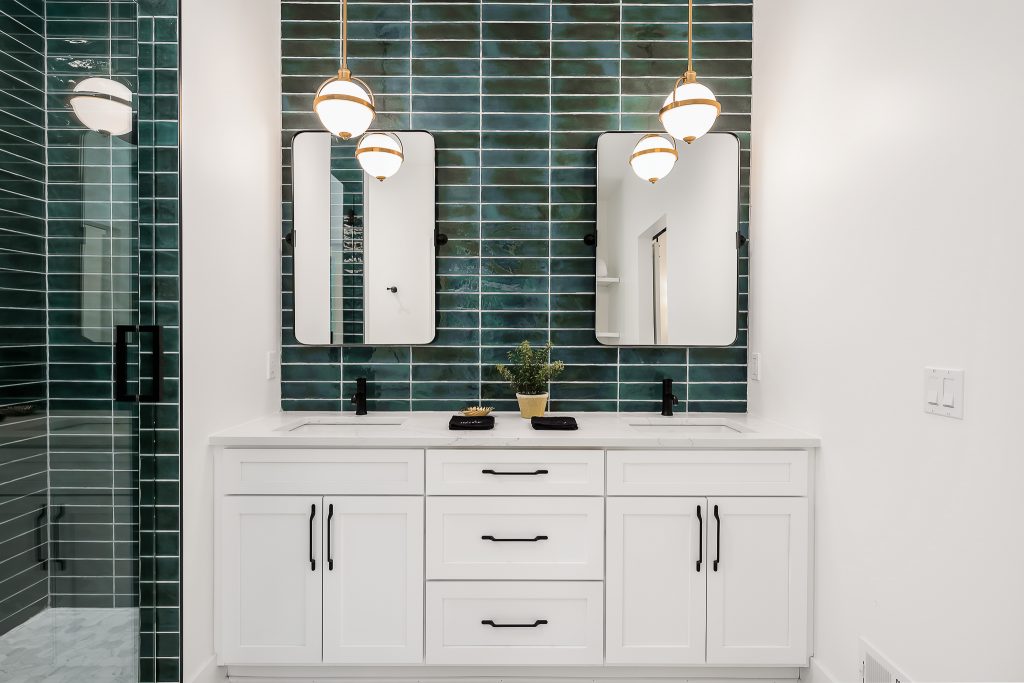 spa like bathroom with green tile