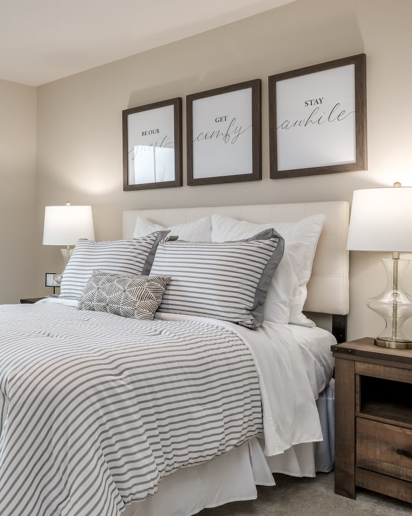 Guest bedroom with cozy neutral bedding